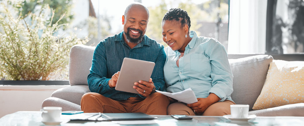 older couple experiencing personalization content on tablet