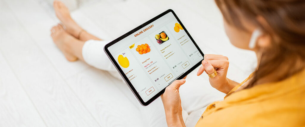 woman buying online groceries based on recommendations from previous shopping experience