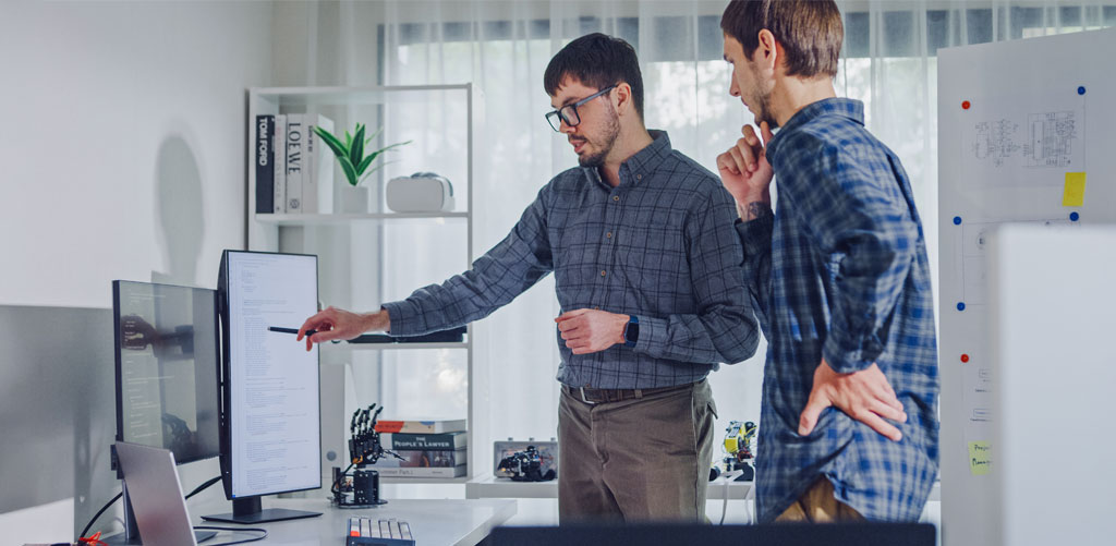 Co-workers using AI analytics access to interpret business data which surfaces new data challenges