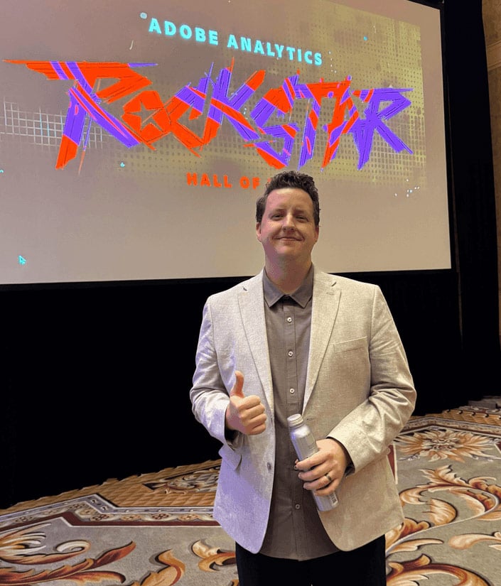 Trent Thayne at Adobe Analytics Rockstar event at Adobe Summit 2025 giving a thumbs up