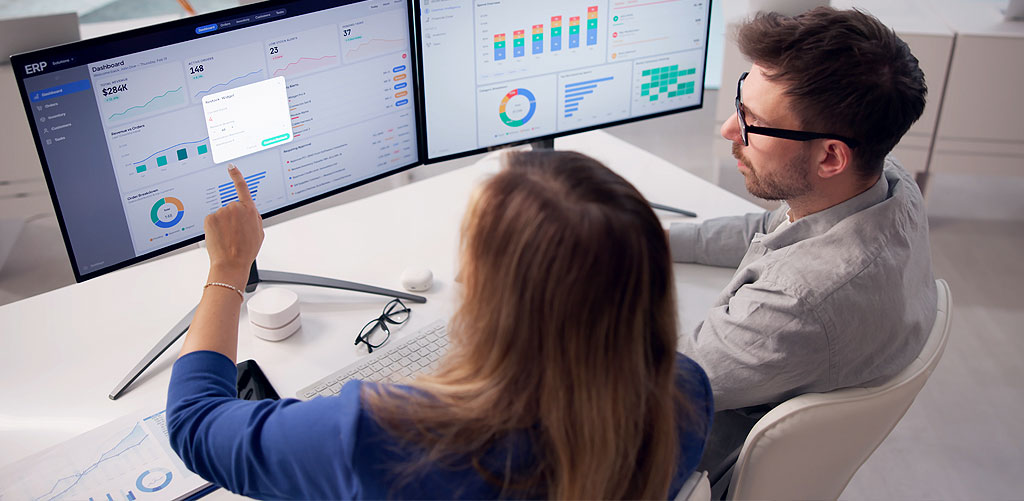 Colleagues managing CX dashboards for measurable ROI