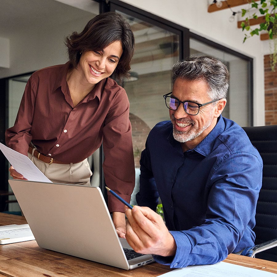 Two teammates delivering actionable insights with a streamline MarTech stack.